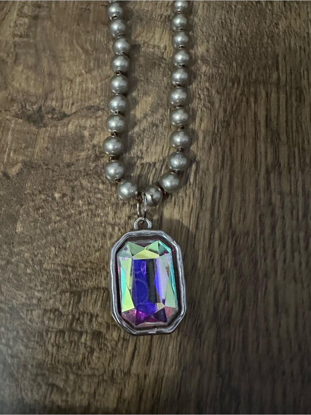 New silver beaded necklace has a huge rectangle iridescent charm,